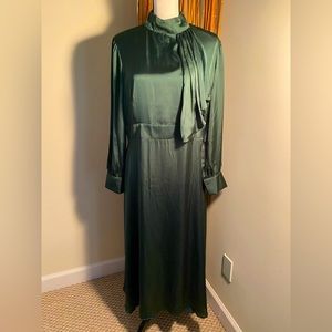 Elegant silk-satin emerald green dress.